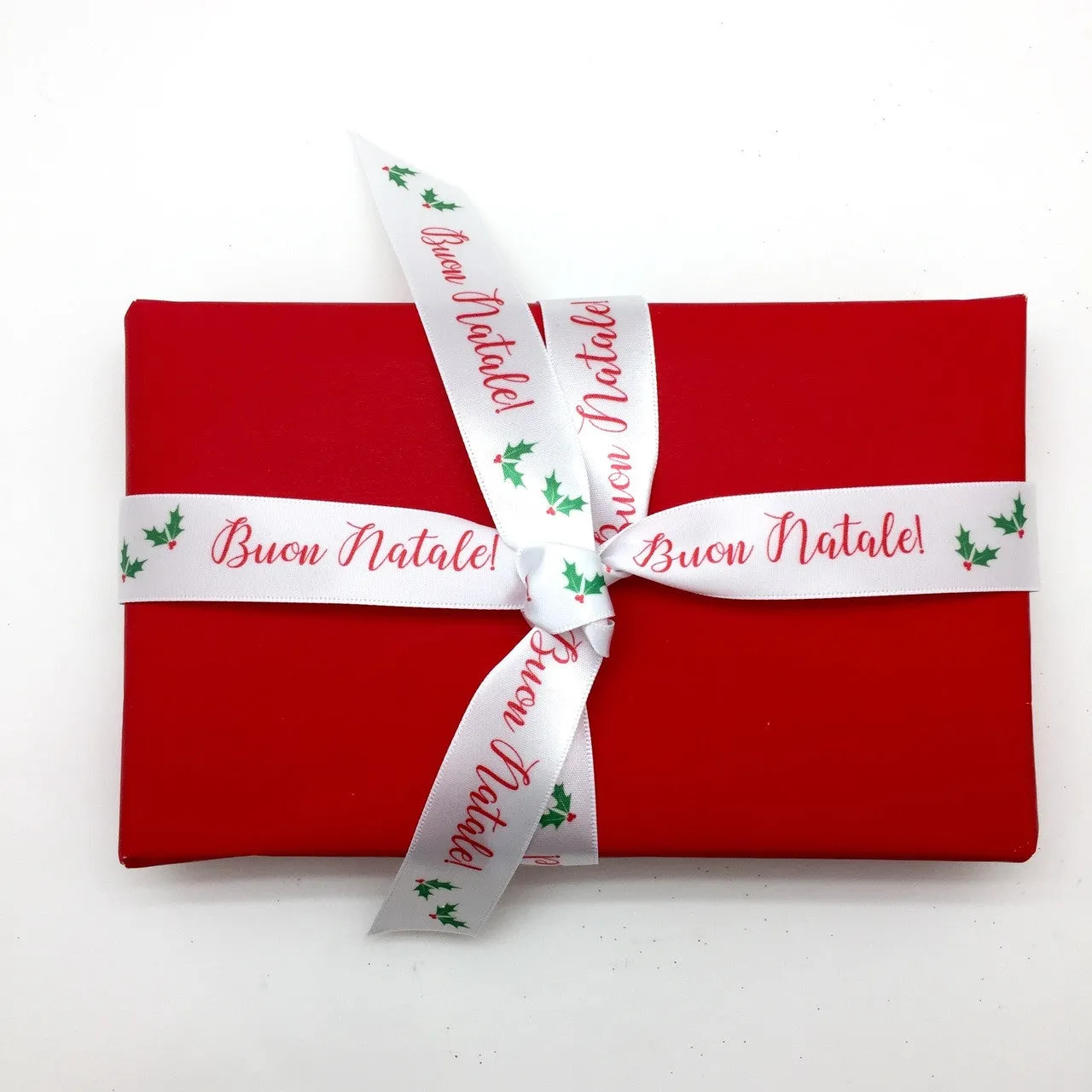 Buon Natale Ribbon with green holly leaves and red berries on 7/8" white single face satin